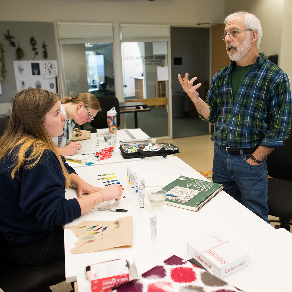 Professor teaching an art class