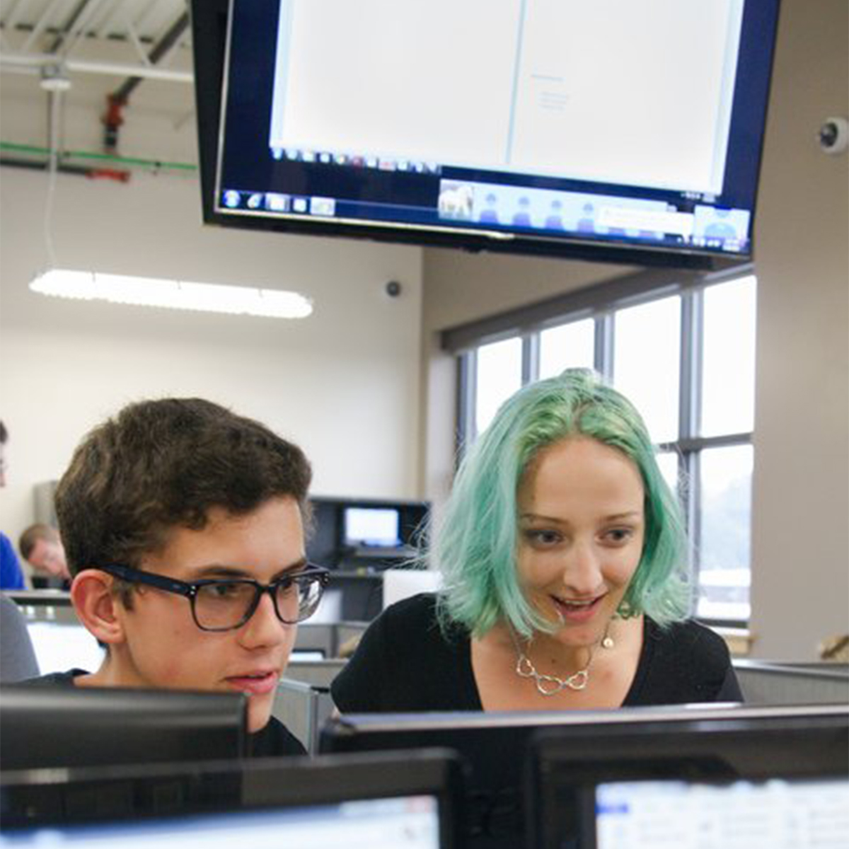 Students working on a computer together