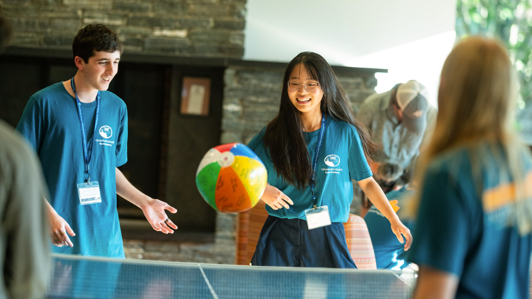pre-college students play beach ball bad mitten